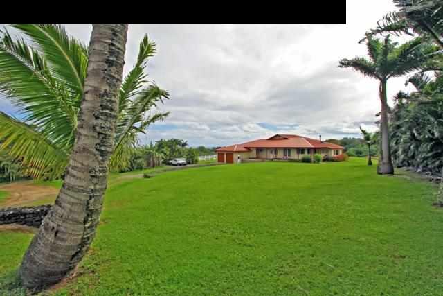 342 Kulike Road, Unit 1 Haiku, HI 96708 - Photo 26 of 30 a view of a house with a yard