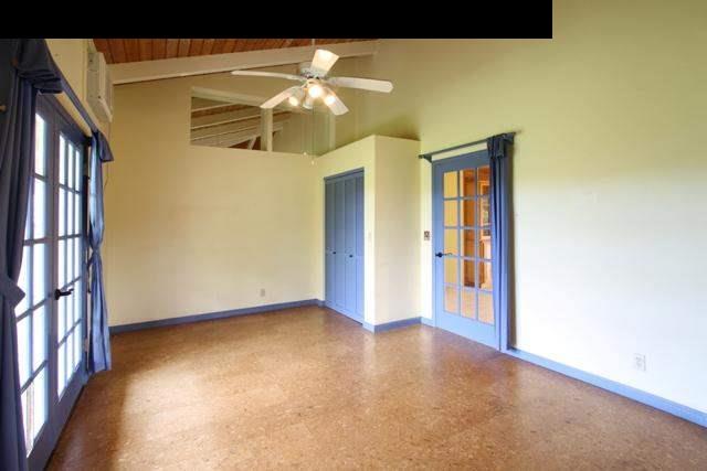 342 Kulike Road, Unit 1 Haiku, HI 96708 - Photo 27 of 30 a view of an empty room with a chandelier