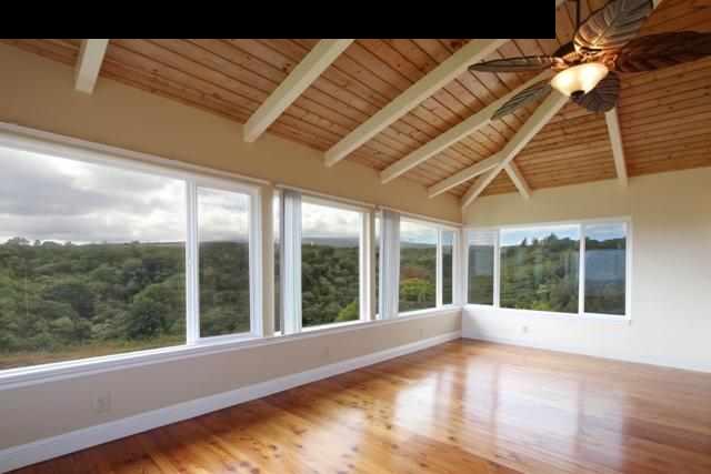 342 Kulike Road, Unit 1 Haiku, HI 96708 - Photo 5 of 30 a view of an empty room with wooden floor and a window