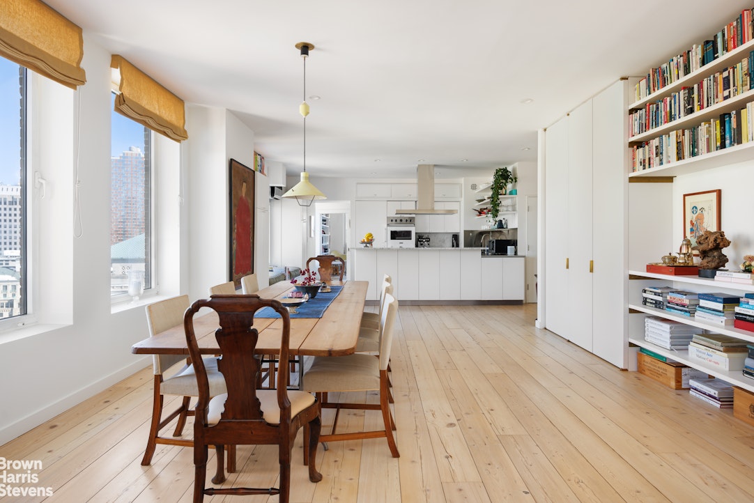 75 Livingston Street, Unit 20A Brooklyn, NY 11201 - Photo 4 of 13 a view of a dining room with furniture and wooden floor
