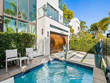 a view of a backyard with a patio
