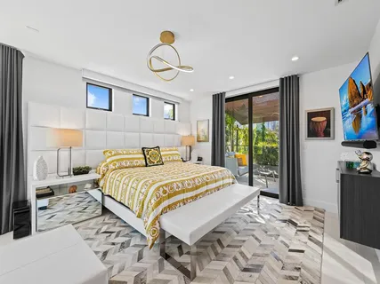 a bedroom with a bed and furniture