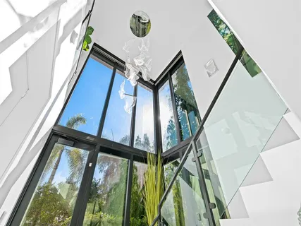 a living room with fireplace furniture and a flat screen tv