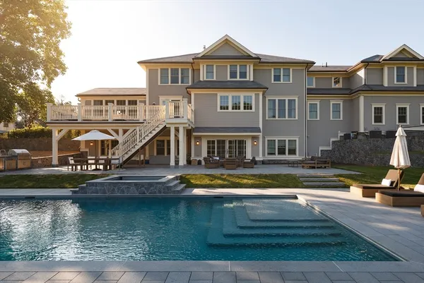 a front view of a house with swimming pool