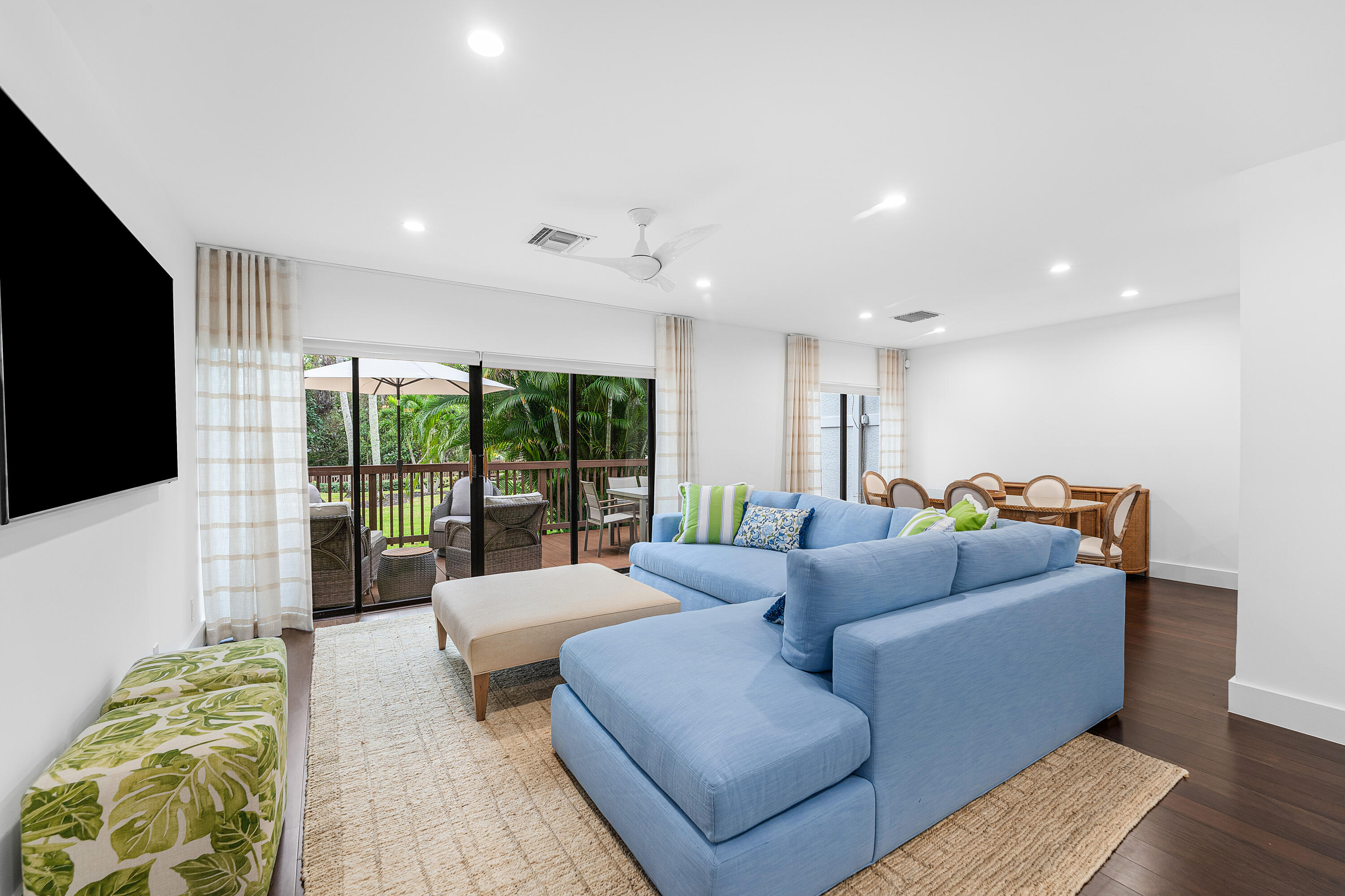 5578 North Ocean Boulevard, Unit 28F Ocean Ridge, FL 33435 - Photo 11 of 47 a living room with furniture and a flat screen tv