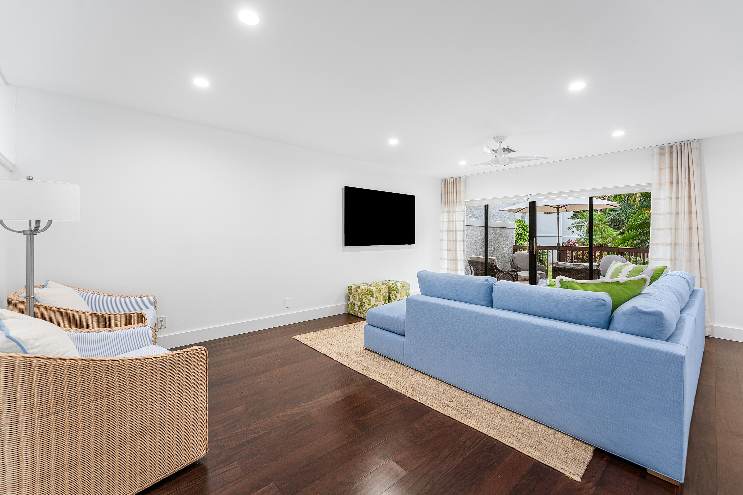 5578 North Ocean Boulevard, Unit 28F Ocean Ridge, FL 33435 - Photo 12 of 47 a living room with furniture and a flat screen tv