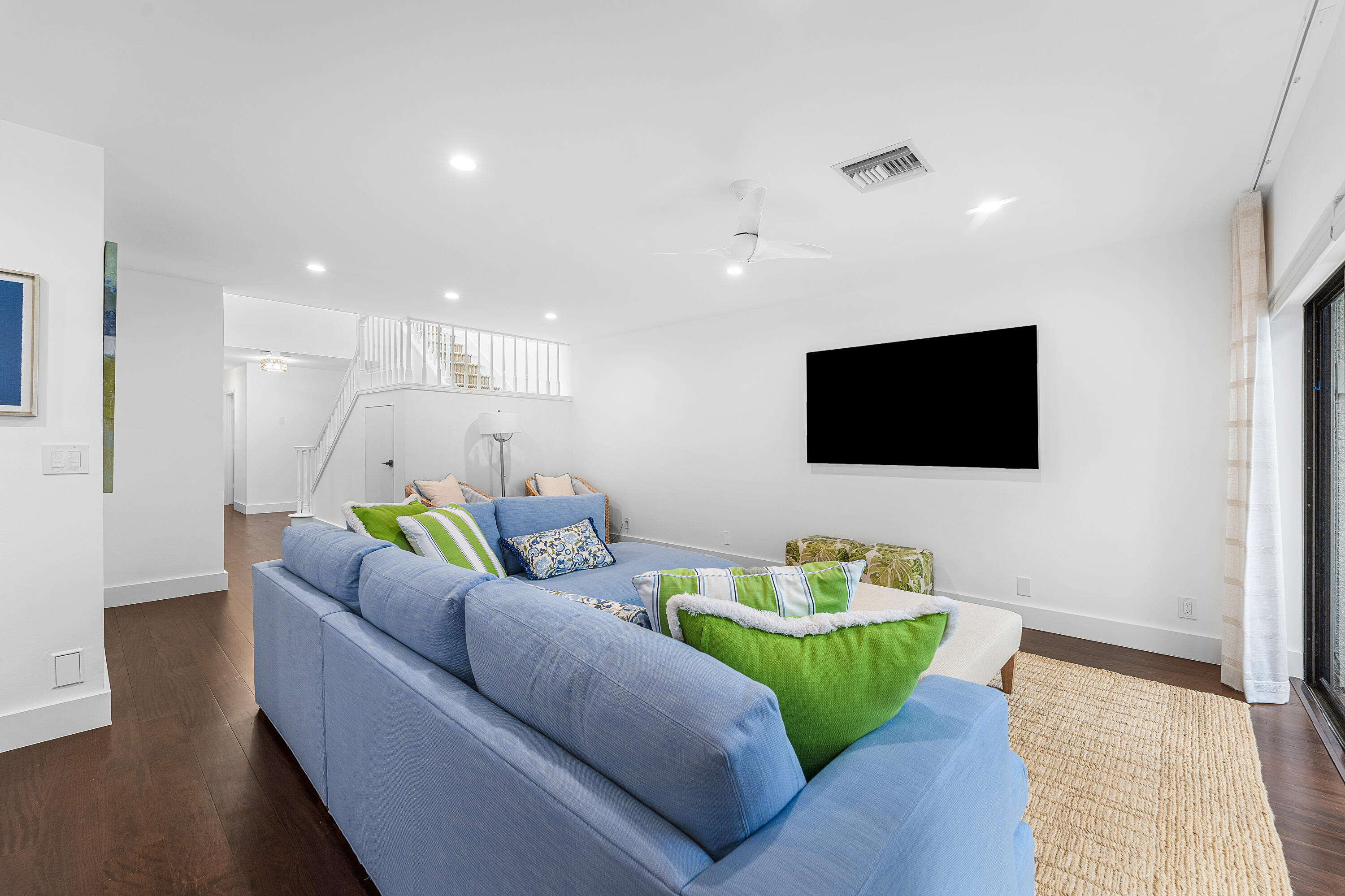 5578 North Ocean Boulevard, Unit 28F Ocean Ridge, FL 33435 - Photo 13 of 47 a living room with furniture and a flat screen tv