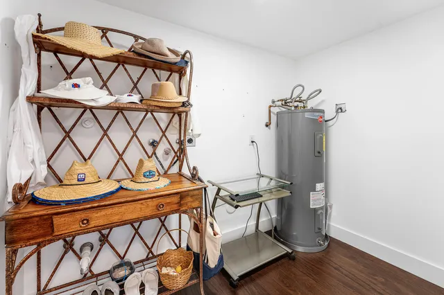 a view of an entryway with wooden floor