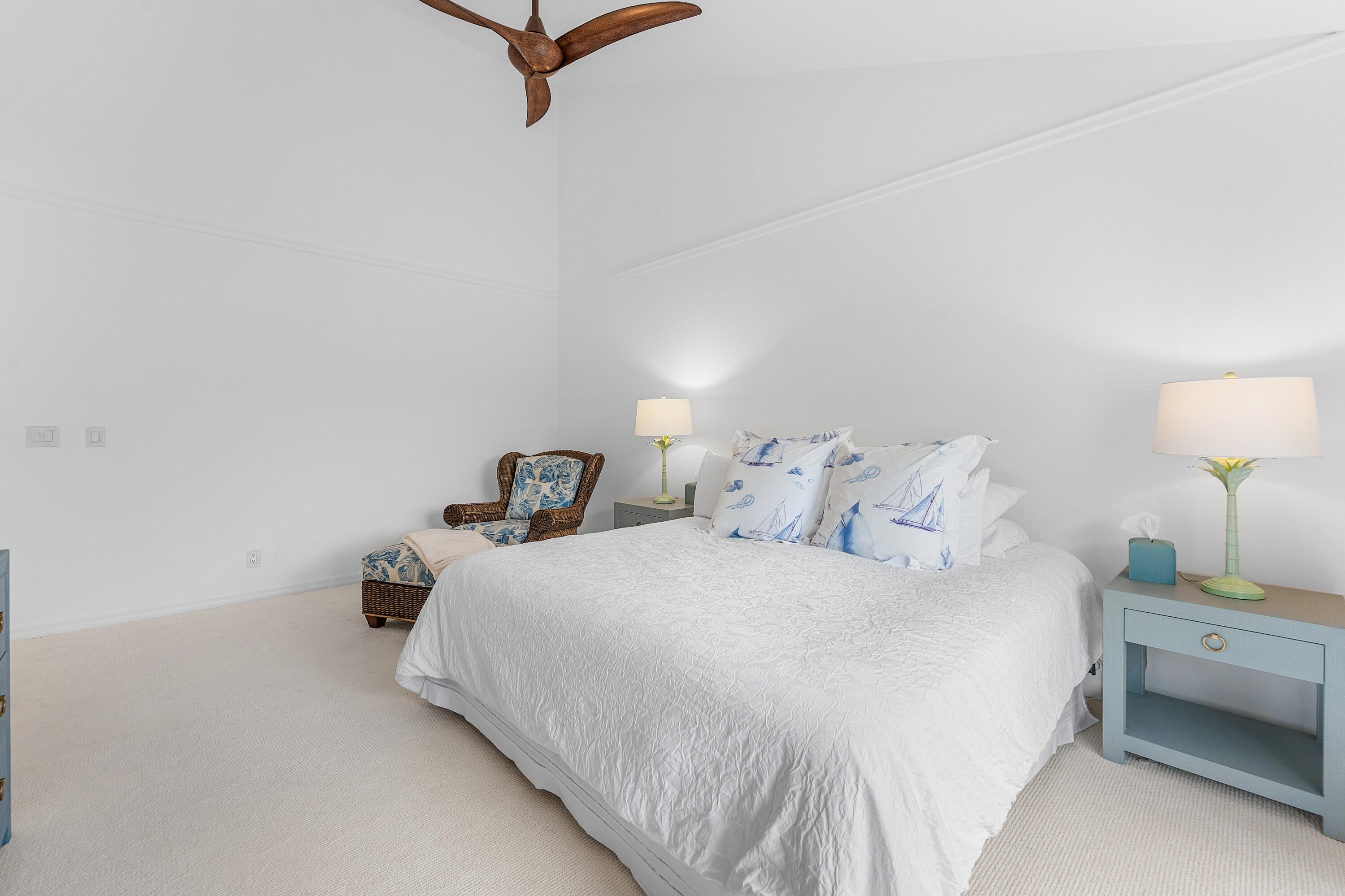 5578 North Ocean Boulevard, Unit 28F Ocean Ridge, FL 33435 - Photo 22 of 47 a bedroom with a bed and a night stand