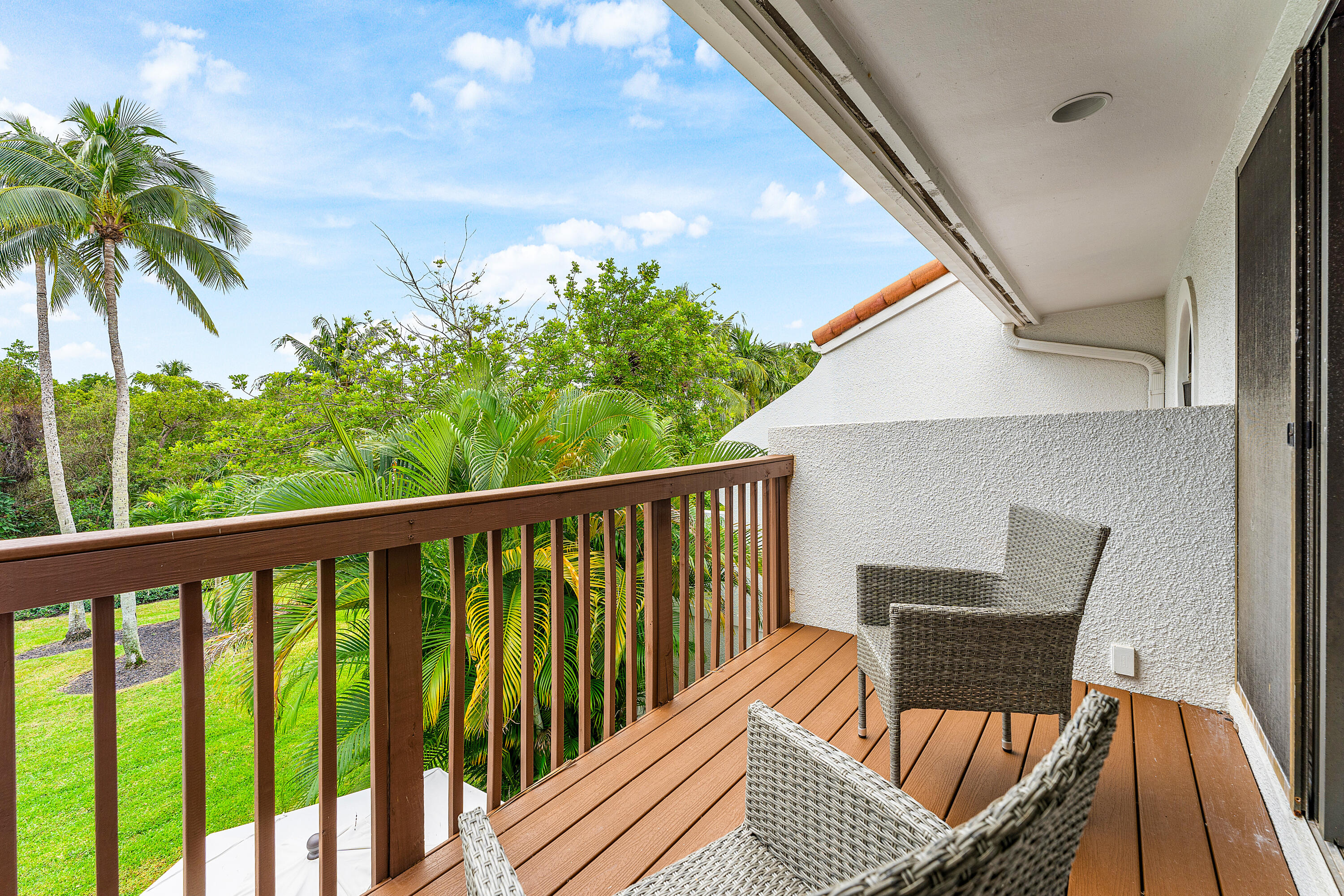 5578 North Ocean Boulevard, Unit 28F Ocean Ridge, FL 33435 - Photo 25 of 47 a view of balcony with furniture and wooden deck