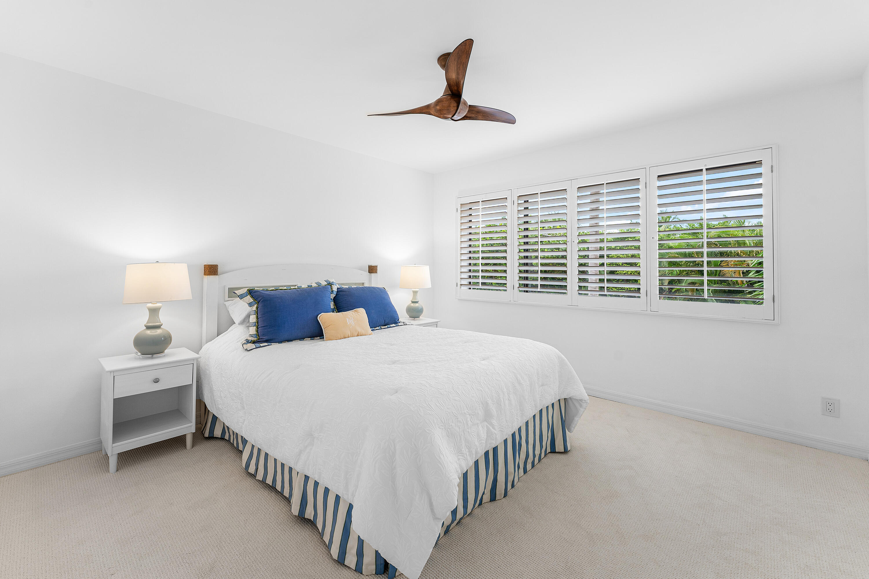 5578 North Ocean Boulevard, Unit 28F Ocean Ridge, FL 33435 - Photo 30 of 47 a bedroom with a bed and a window