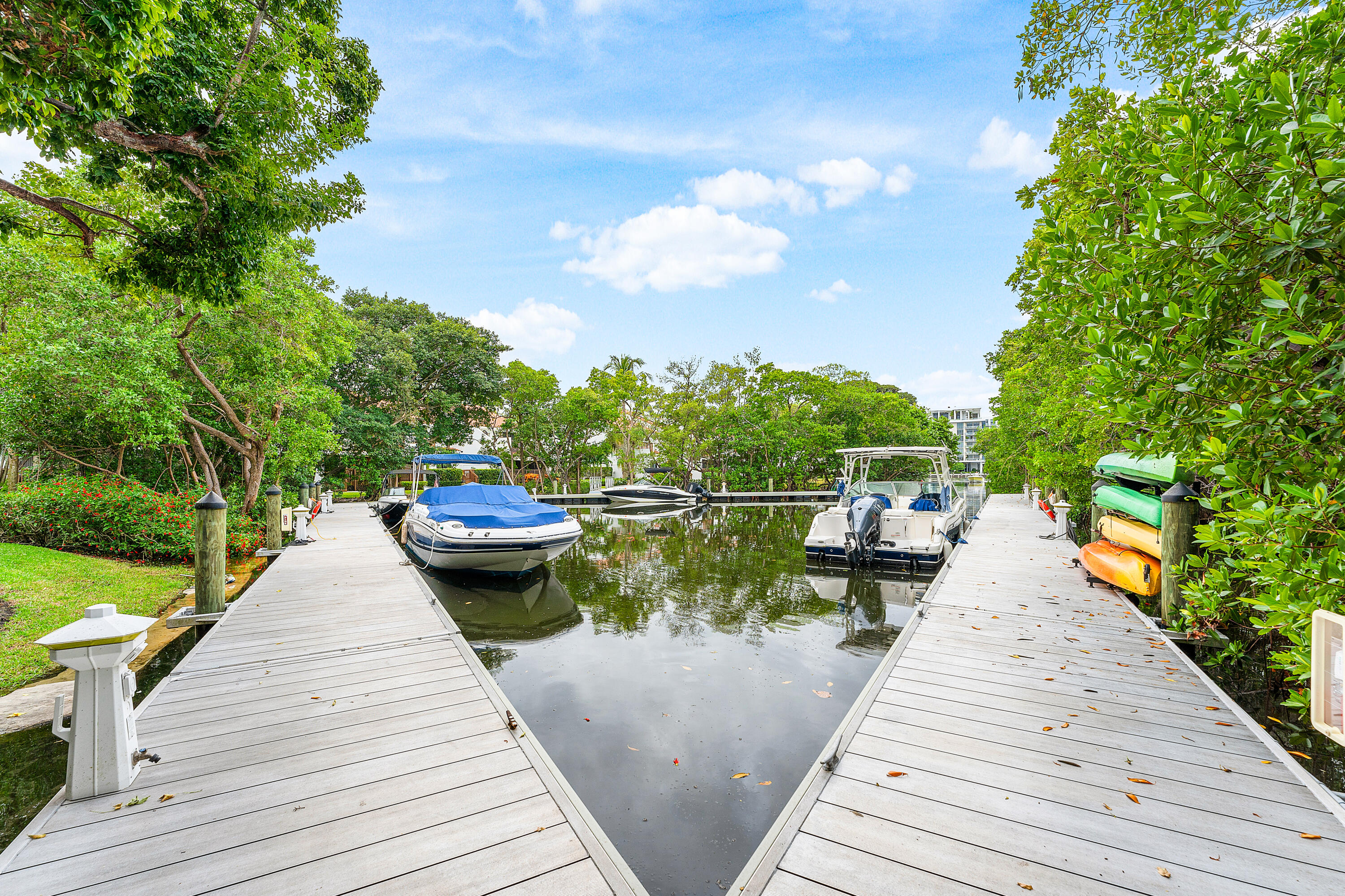 5578 North Ocean Boulevard, Unit 28F Ocean Ridge, FL 33435 - Photo 35 of 47 a view of a patio with couches table and chairs and potted plants