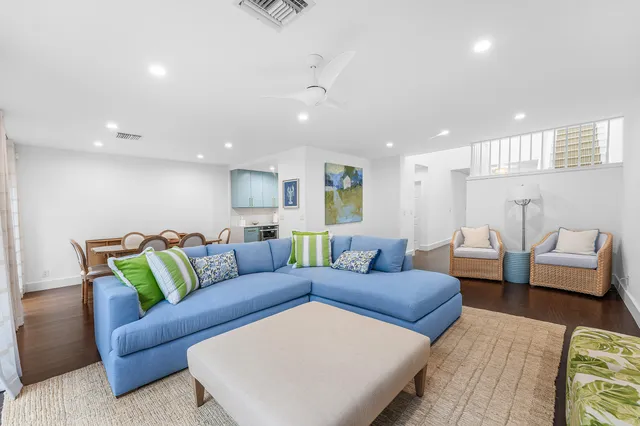 a living room with furniture and a couch