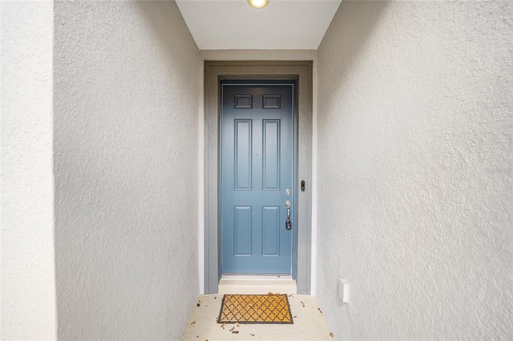8491 Southwest 52nd Ln Road Ocala, FL 34481 - Photo 3 of 45 a view of an entryway door