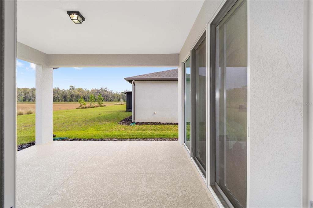8491 Southwest 52nd Ln Road Ocala, FL 34481 - Photo 32 of 45 a view of a house and outdoor space
