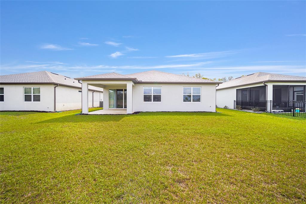 8491 Southwest 52nd Ln Road Ocala, FL 34481 - Photo 37 of 45 a view of a house with a swimming pool