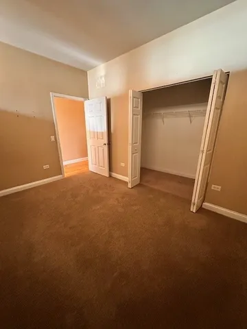 a bathroom with a toilet and a bath tub