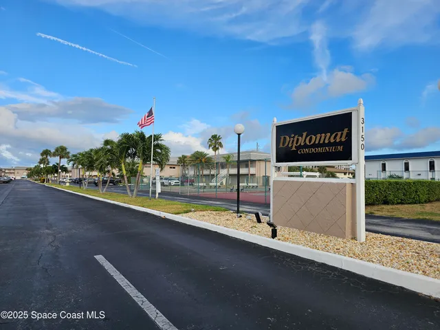 a view of a building with a street view