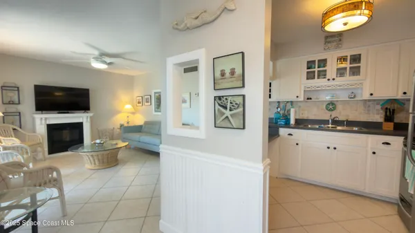 a kitchen with a sink and a stove top oven