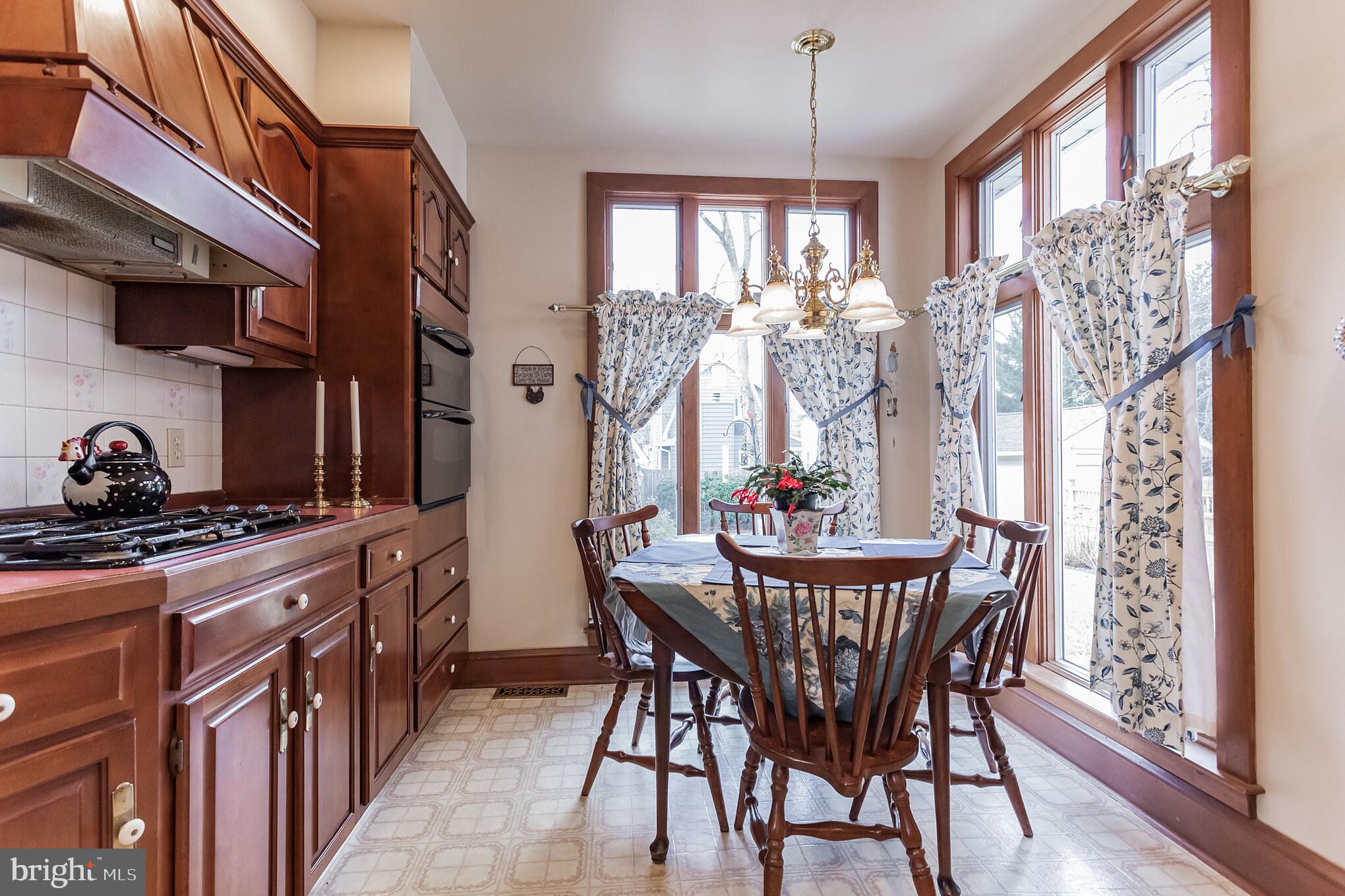 316 Chestnut Street Haddonfield, NJ 08033 - Photo 12 of 30 a view of a dining room with furniture and chandelier