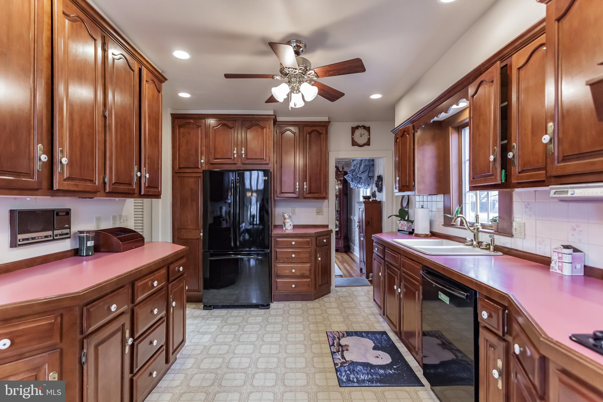 316 Chestnut Street Haddonfield, NJ 08033 - Photo 14 of 30 a kitchen with stainless steel appliances granite countertop a sink stove and refrigerator