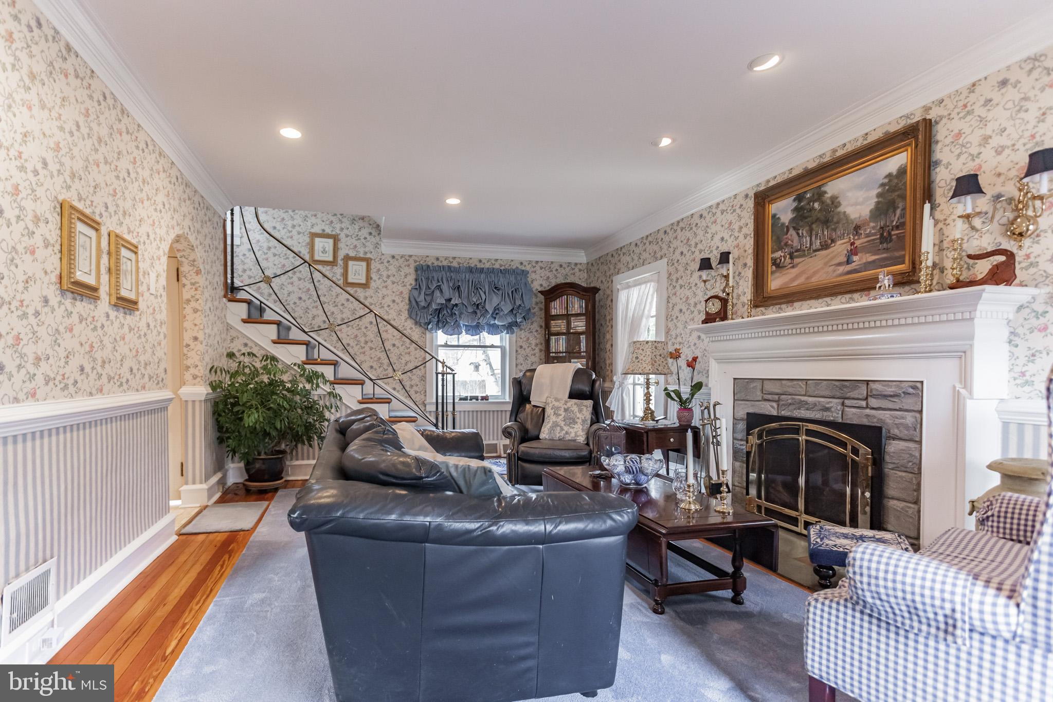 316 Chestnut Street Haddonfield, NJ 08033 - Photo 3 of 30 a living room with furniture and a fireplace