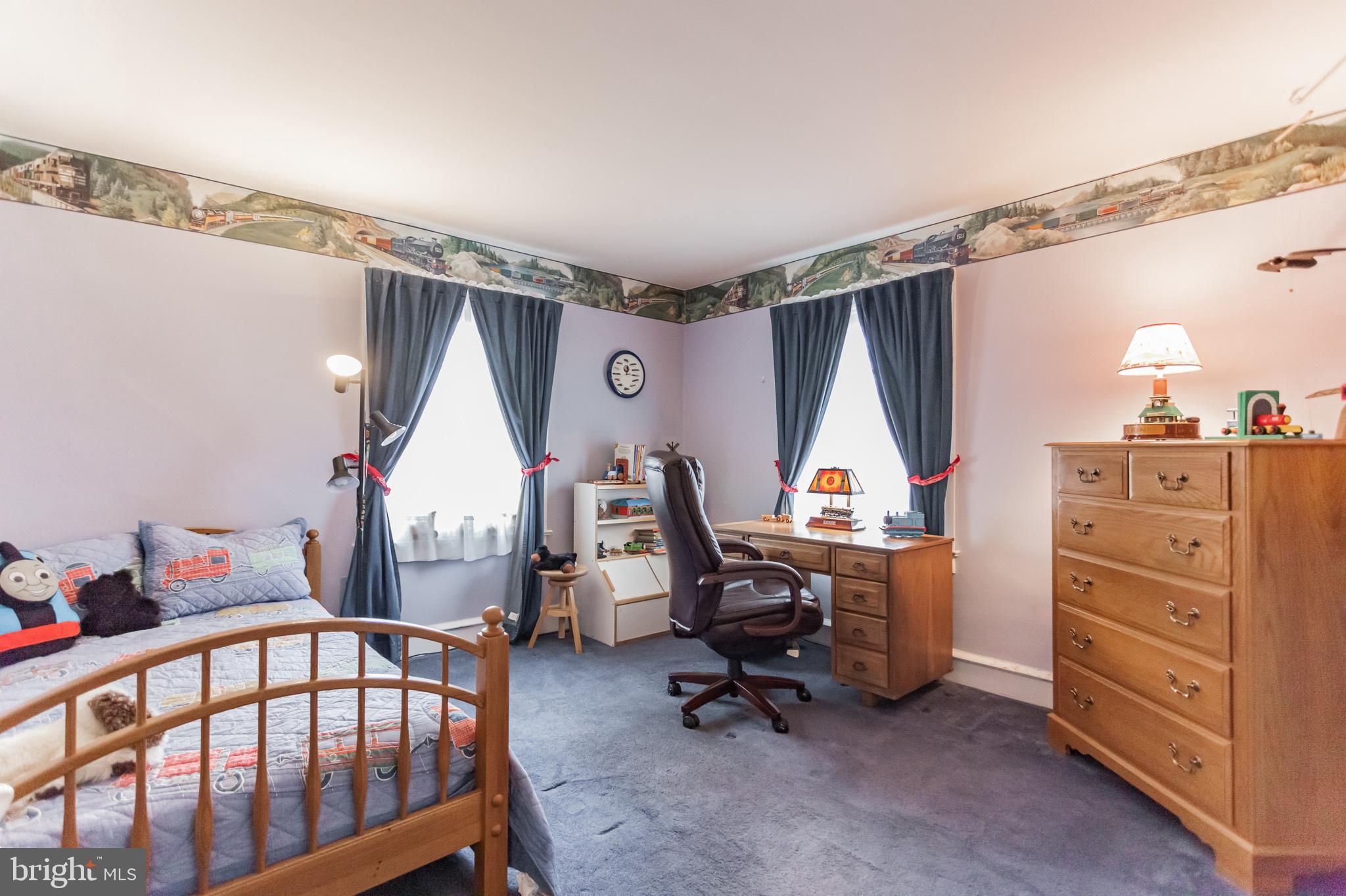 316 Chestnut Street Haddonfield, NJ 08033 - Photo 23 of 30 a view of a bedroom with furniture window and a wooden floor
