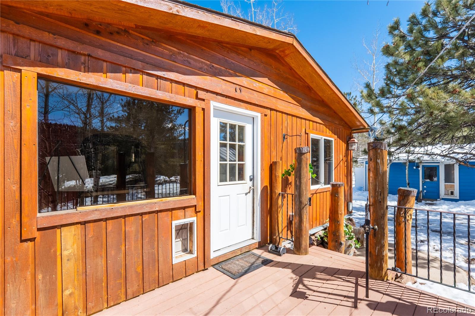 252 Jones Road Bailey, CO 80421 - Photo 3 of 36 a view of entrance with a house and wooden fence