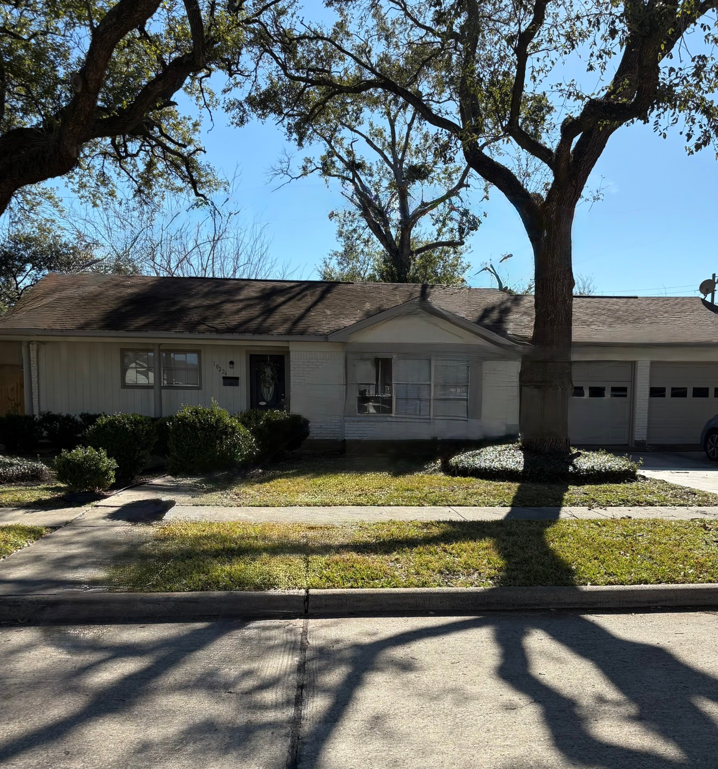 a view of house with yard