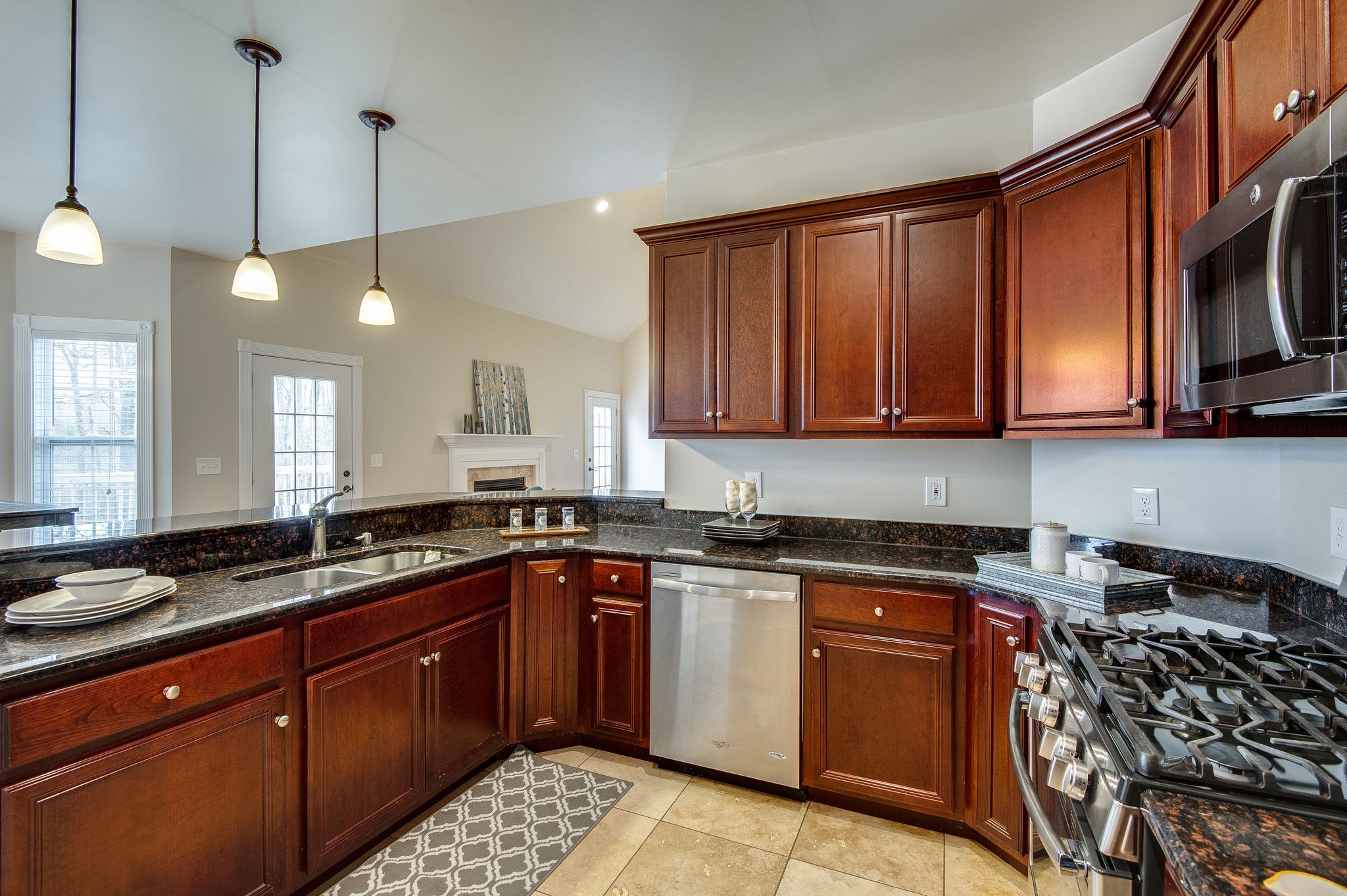 427 Kaiser Road Dickson, TN 37055 - Photo 6 of 33 a kitchen with stainless steel appliances a sink stove and microwave