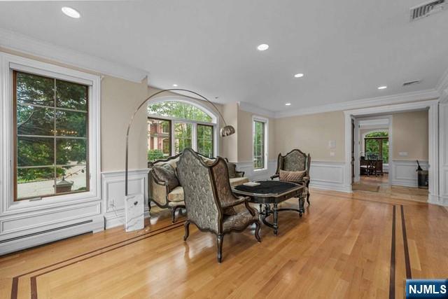 1 Euclid Road Fort Lee, NJ 07024 - Photo 19 of 50 a living room with furniture and a large window