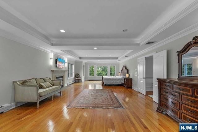 1 Euclid Road Fort Lee, NJ 07024 - Photo 24 of 50 a living room with furniture and a wooden floor
