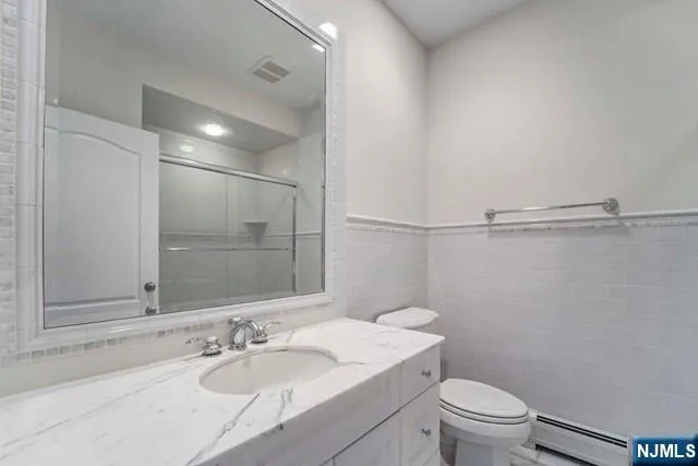 a bedroom with bed and window