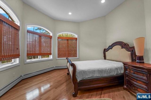 1 Euclid Road Fort Lee, NJ 07024 - Photo 33 of 50 a bedroom with bed and window
