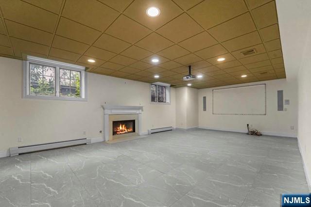 1 Euclid Road Fort Lee, NJ 07024 - Photo 35 of 50 a view of an empty room with a fireplace