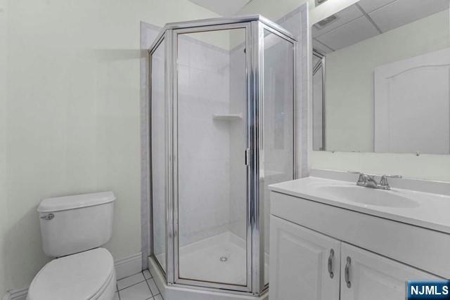 1 Euclid Road Fort Lee, NJ 07024 - Photo 39 of 50 a bathroom with a shower a toilet and sink