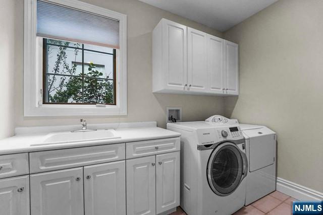 1 Euclid Road Fort Lee, NJ 07024 - Photo 44 of 50 a utility room with dryer and washer