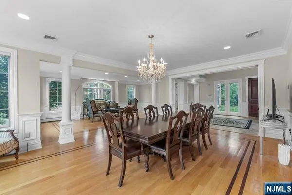 a view of a dining room with furniture window and outside view