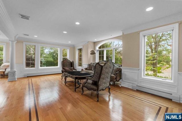 1 Euclid Road Fort Lee, NJ 07024 - Photo 9 of 50 a living room with furniture and a wooden floor
