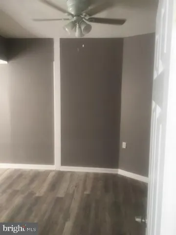 an empty room with a empty space and a window