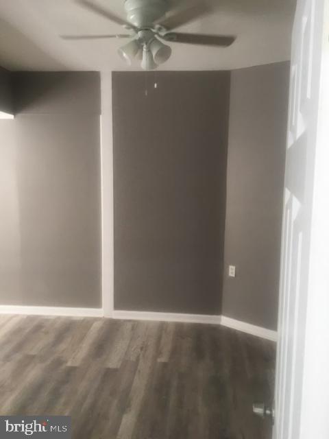 1402 Collings Road, Unit DOWNSTAIRS Camden, NJ 08104 - Photo 7 of 12 an empty room with a empty space and a window