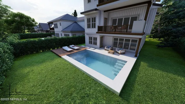 a front view of house with yard and outdoor seating