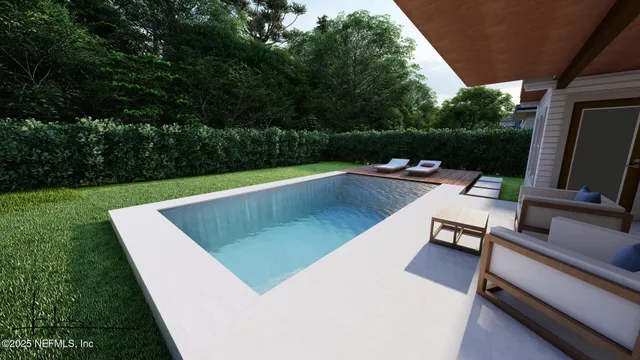 a view of a swimming pool with a patio
