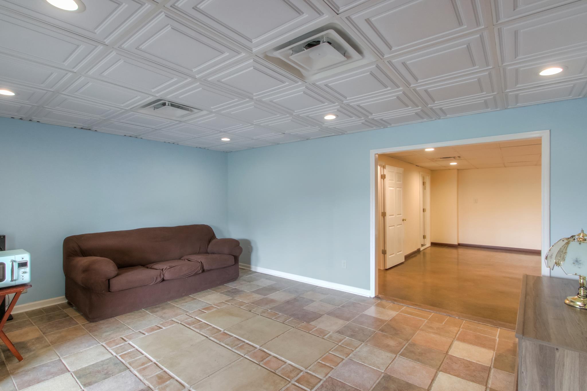 1046 Rocky Valley Road Lebanon, TN 37090 - Photo 16 of 30 Downstairs you come into a separate den....