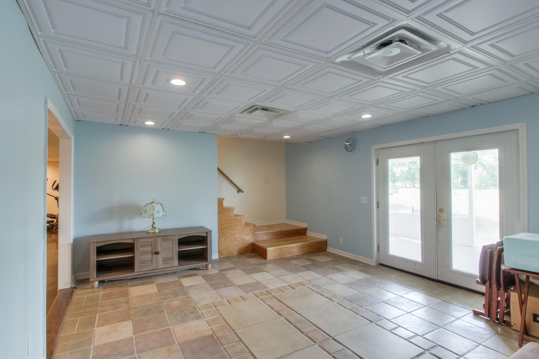 1046 Rocky Valley Road Lebanon, TN 37090 - Photo 17 of 30 with an exterior door leading to the back covered patio
