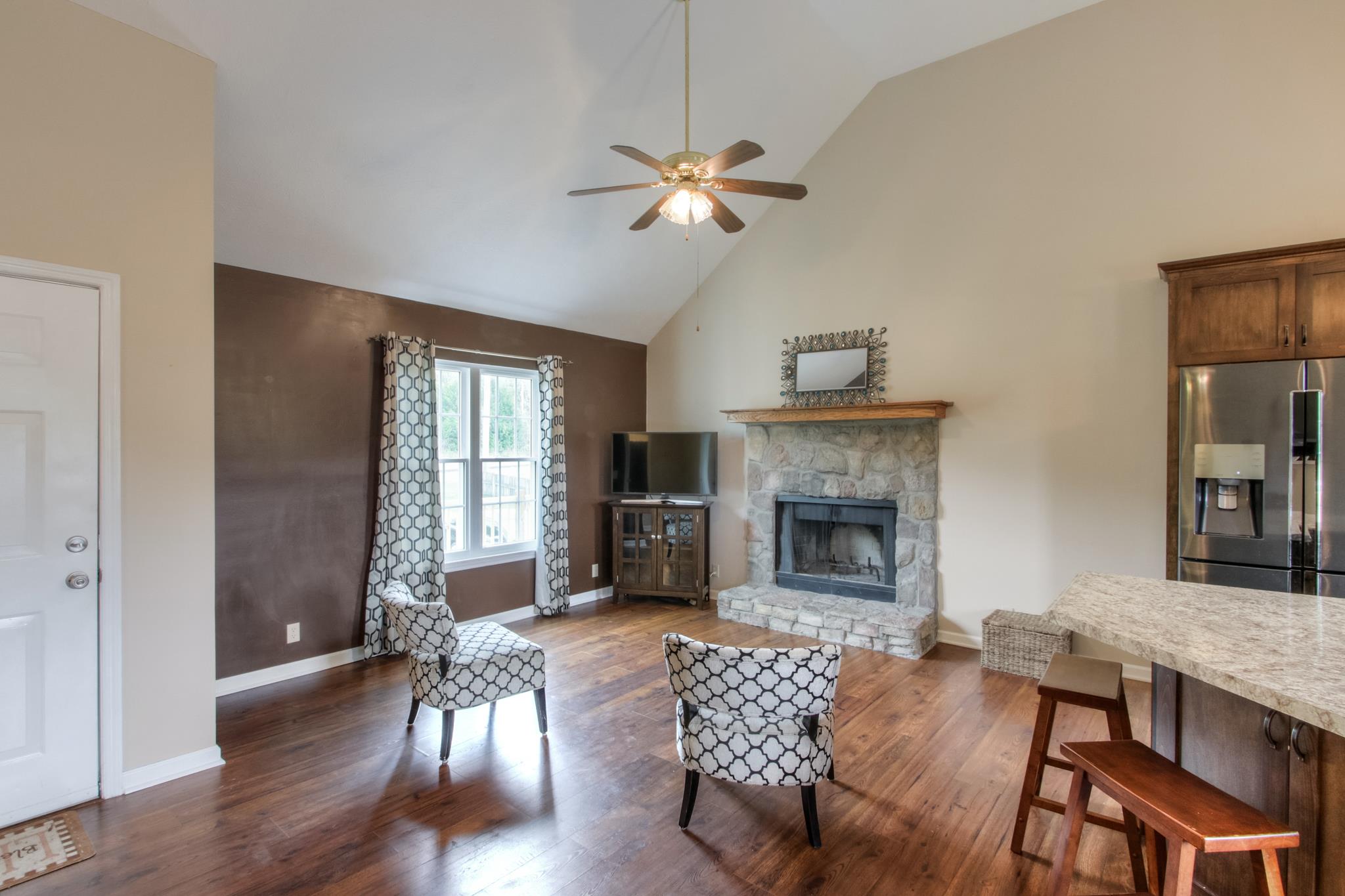 Inside the front door off of the amazing front deck is the open living room...