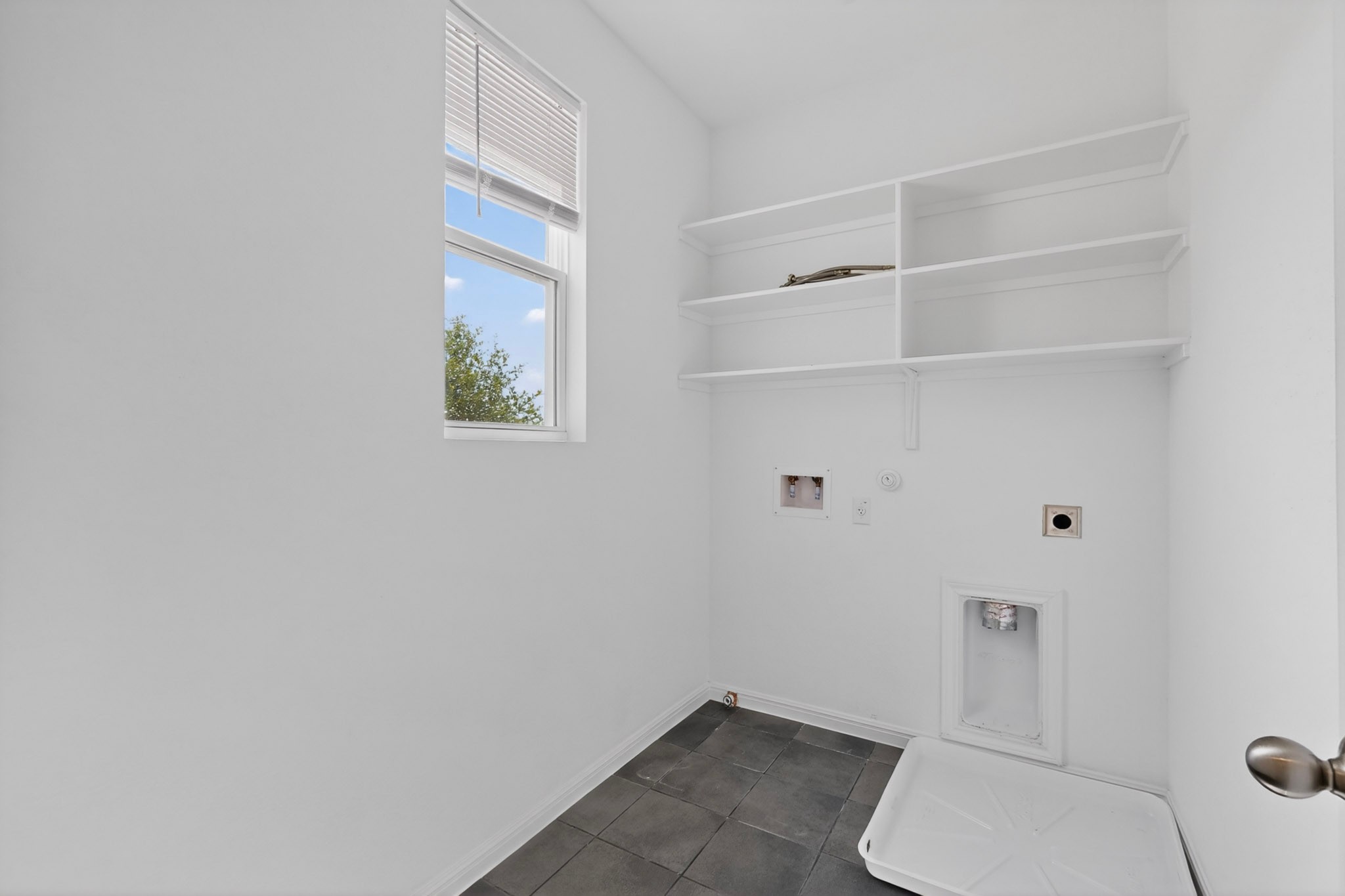 2524 Acoma Lane Leander, TX 78641 - Photo 23 of 27 a bathroom with a toilet and a shower