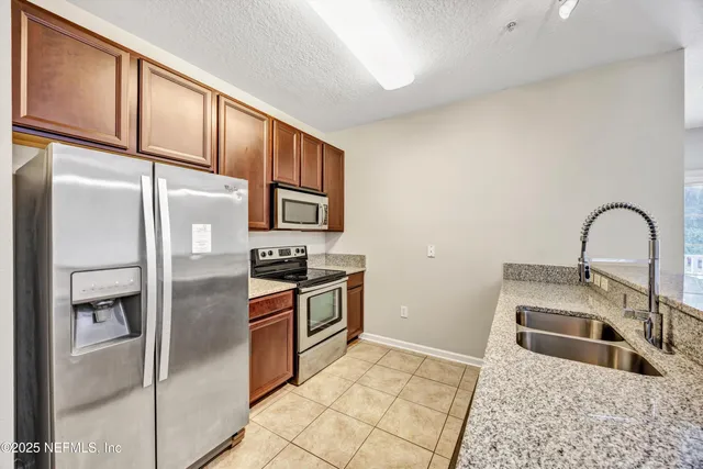 $154,000 | 5006 Key Lime Drive, Unit 203, Jacksonville, FL 32256