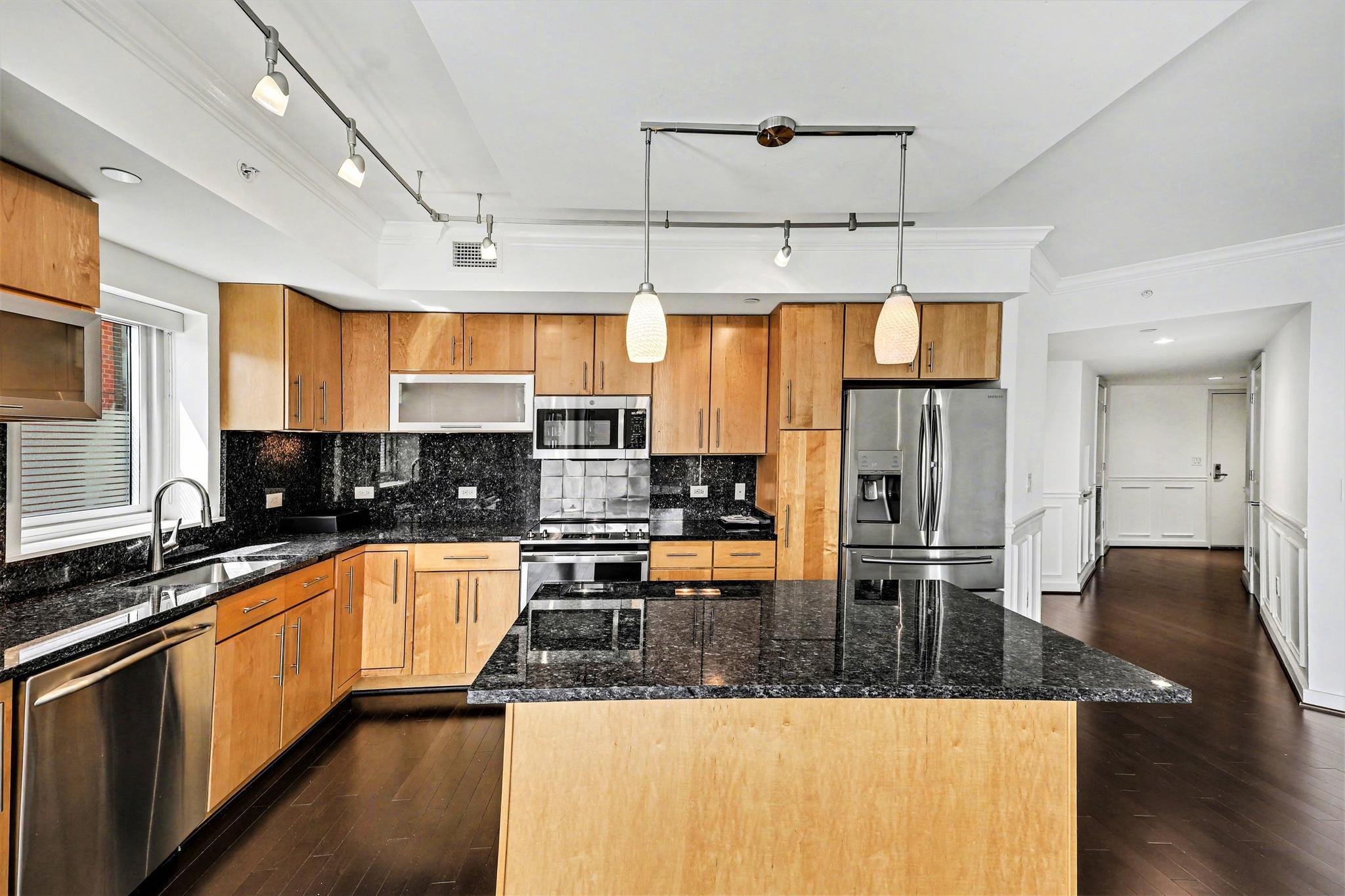 1025 First Street Southeast, Unit 906 Washington, DC 20003 - Photo 4 of 34 A perfect kitchen layout with window!
