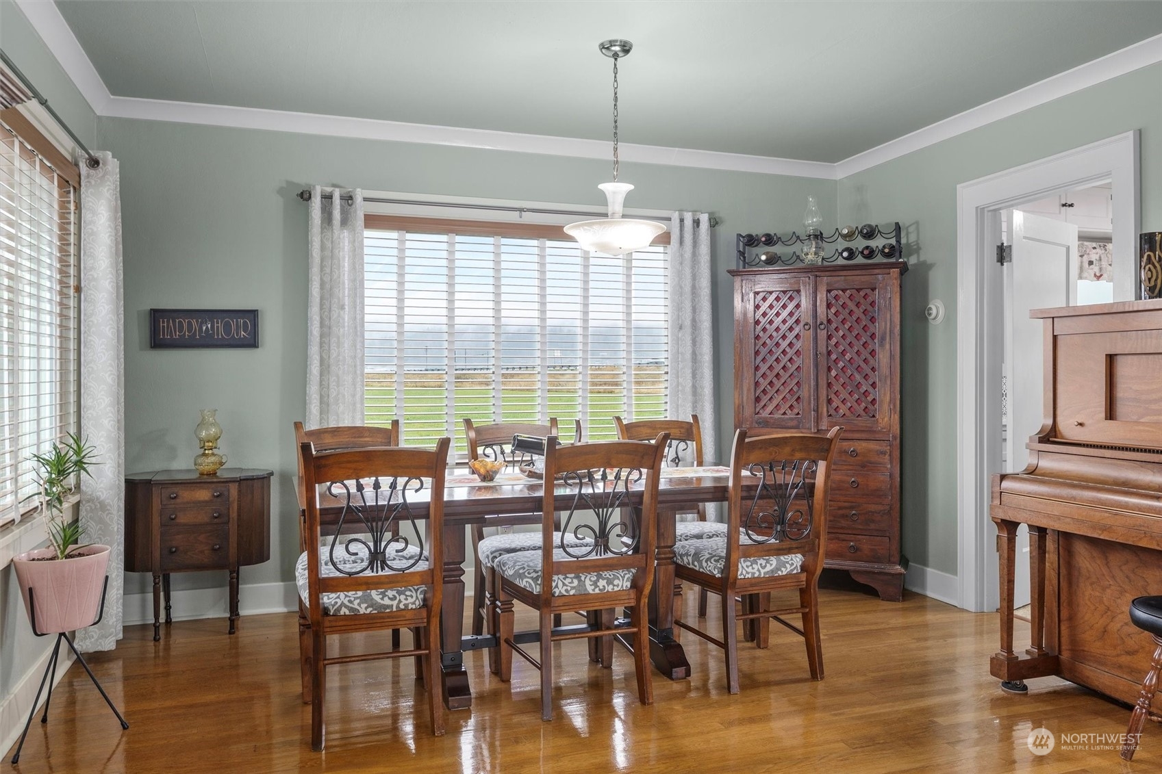 20925 Conway Frontage Road Mount Vernon, WA 98273 - Photo 11 of 40 a view of a dining room with furniture window and wooden floor